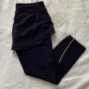 LuluLemon Steadfast Crop leggins skirted Size 6 navy purple zip legs